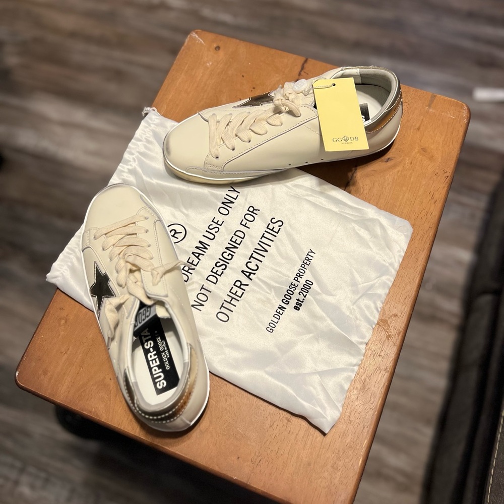 Golden Goose Cream and Black Sneakers